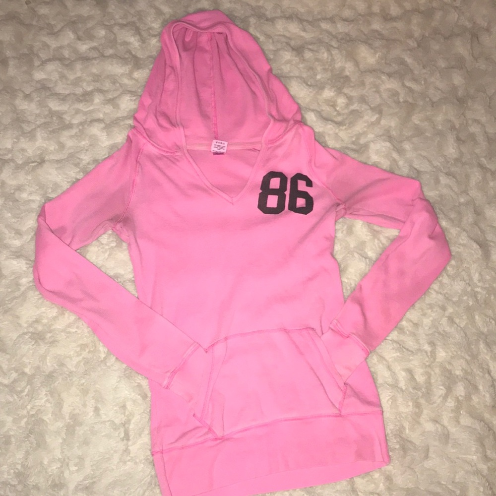 Pink long sleeved hooded shirt